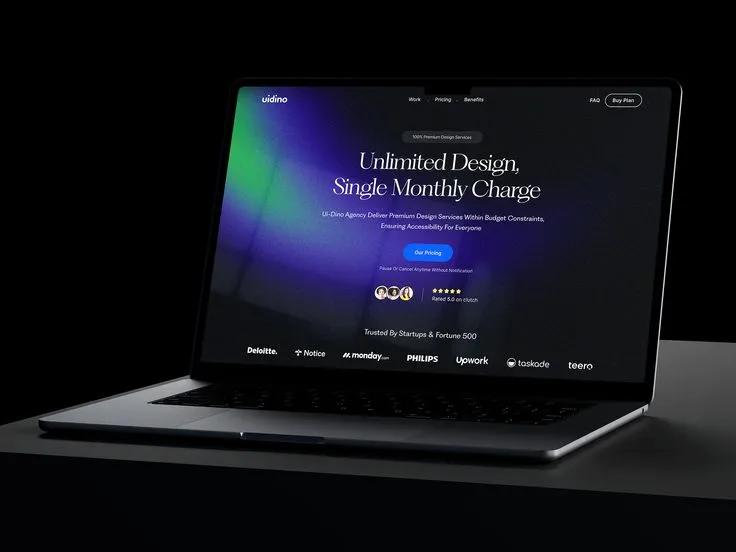 A sleek laptop showing a modern website dashboard